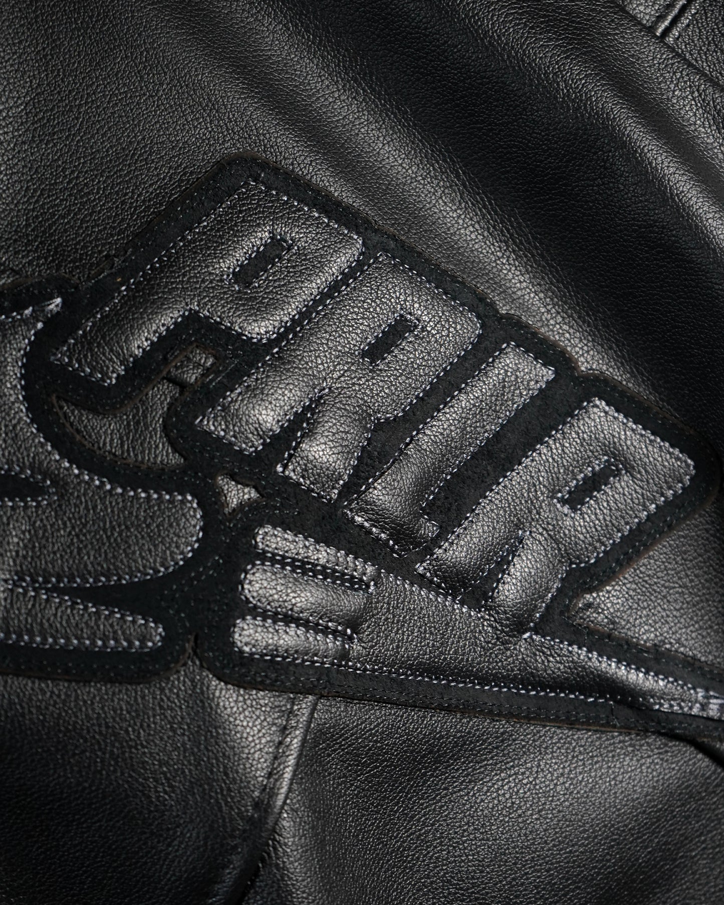 "Ten Years" Leather Varsity