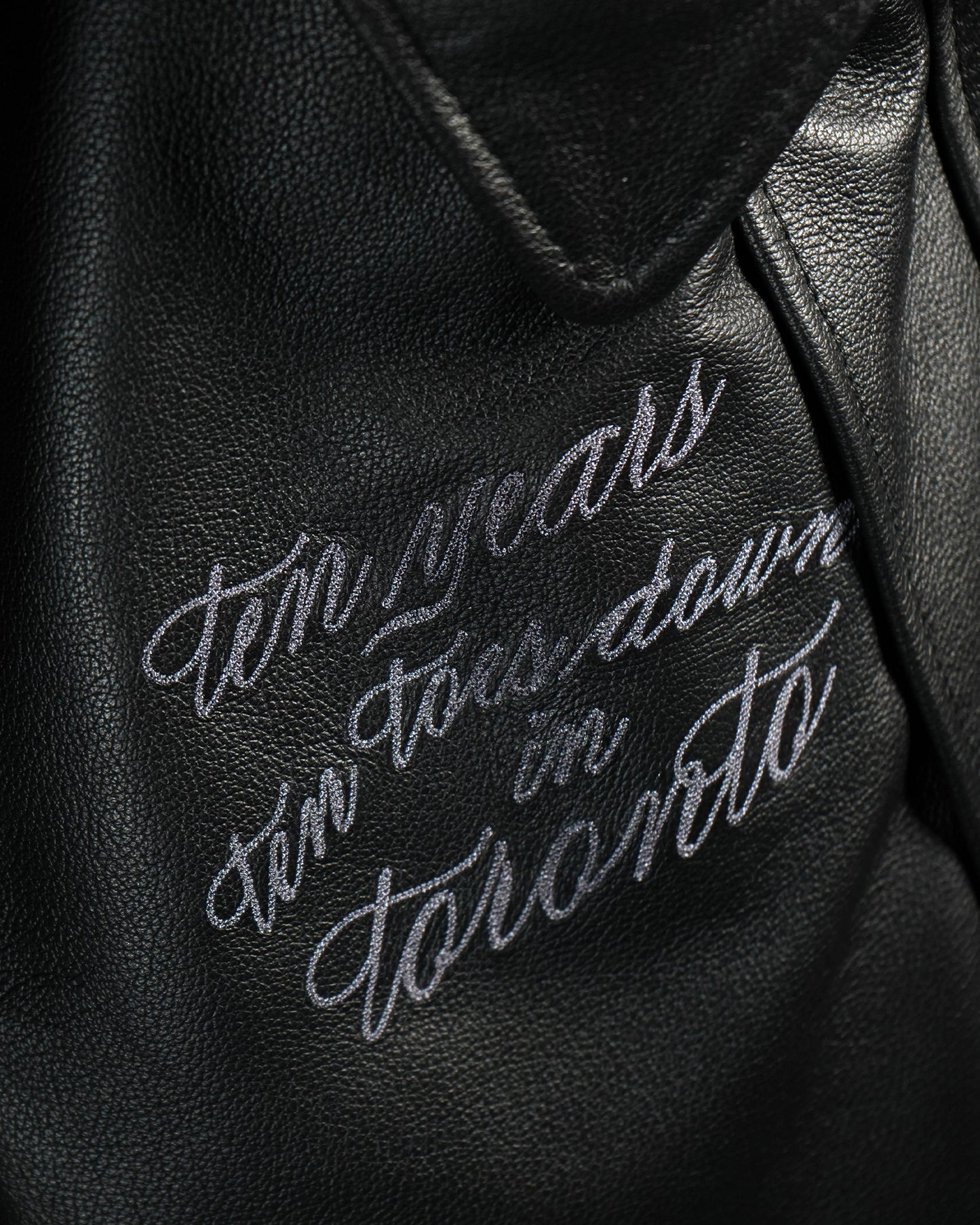 "Ten Years" Leather Varsity