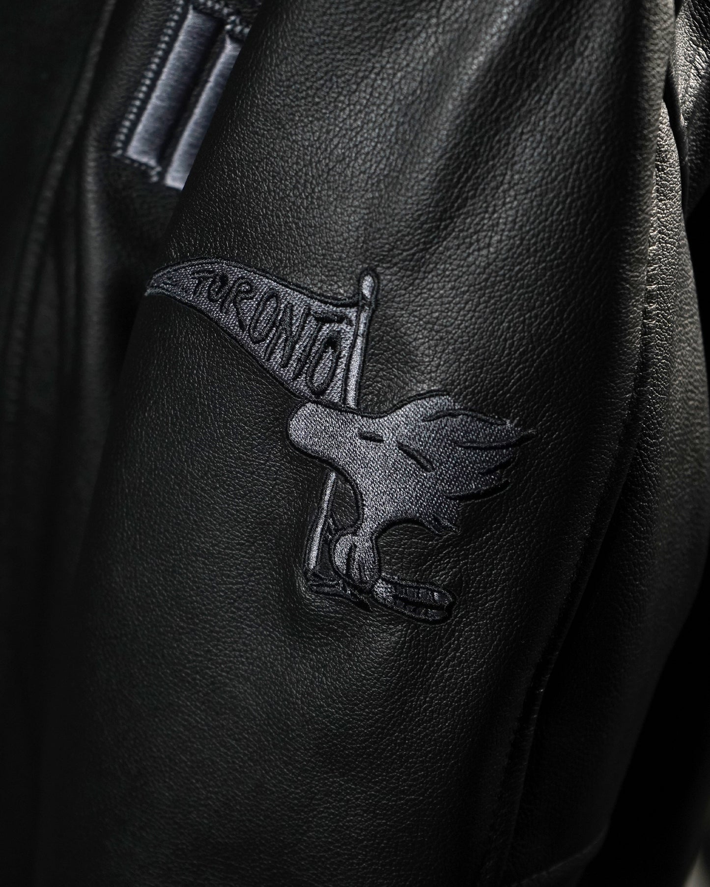 "Ten Years" Leather Varsity
